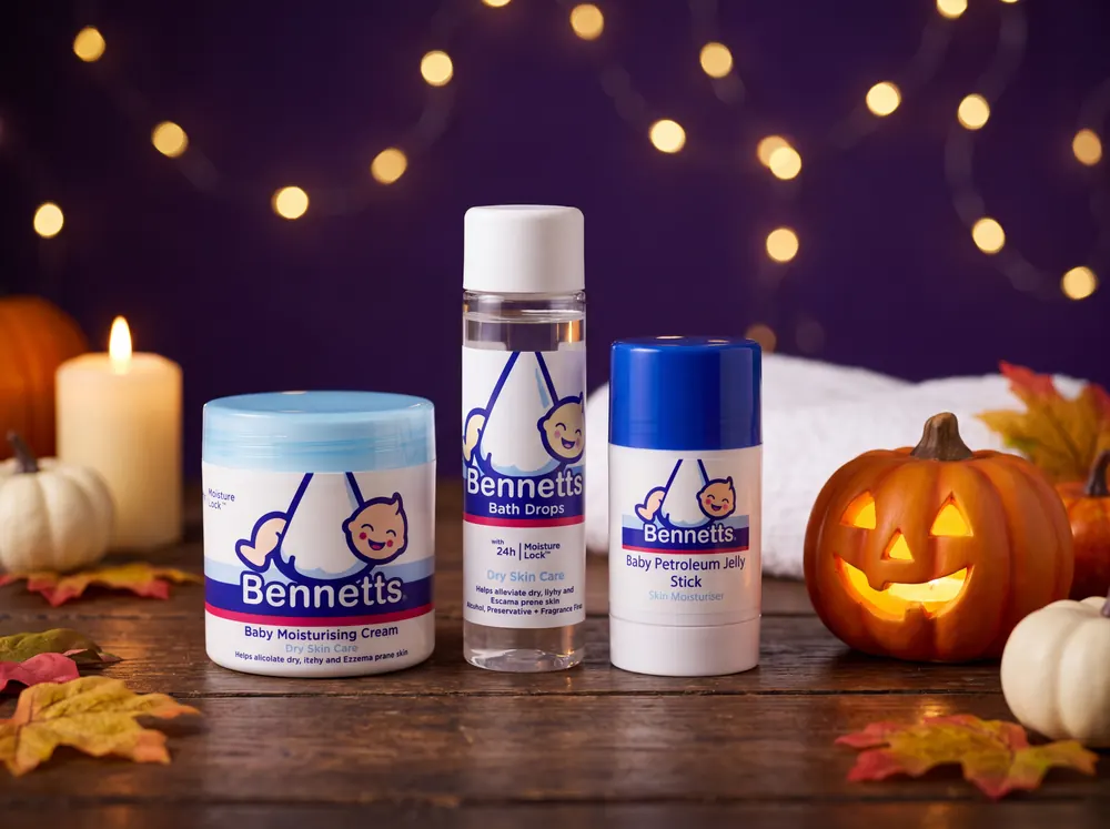 Bennetts Moisturising Cream, Bath Drops and a Petroleum Jelly Stick on wood with pumpkins